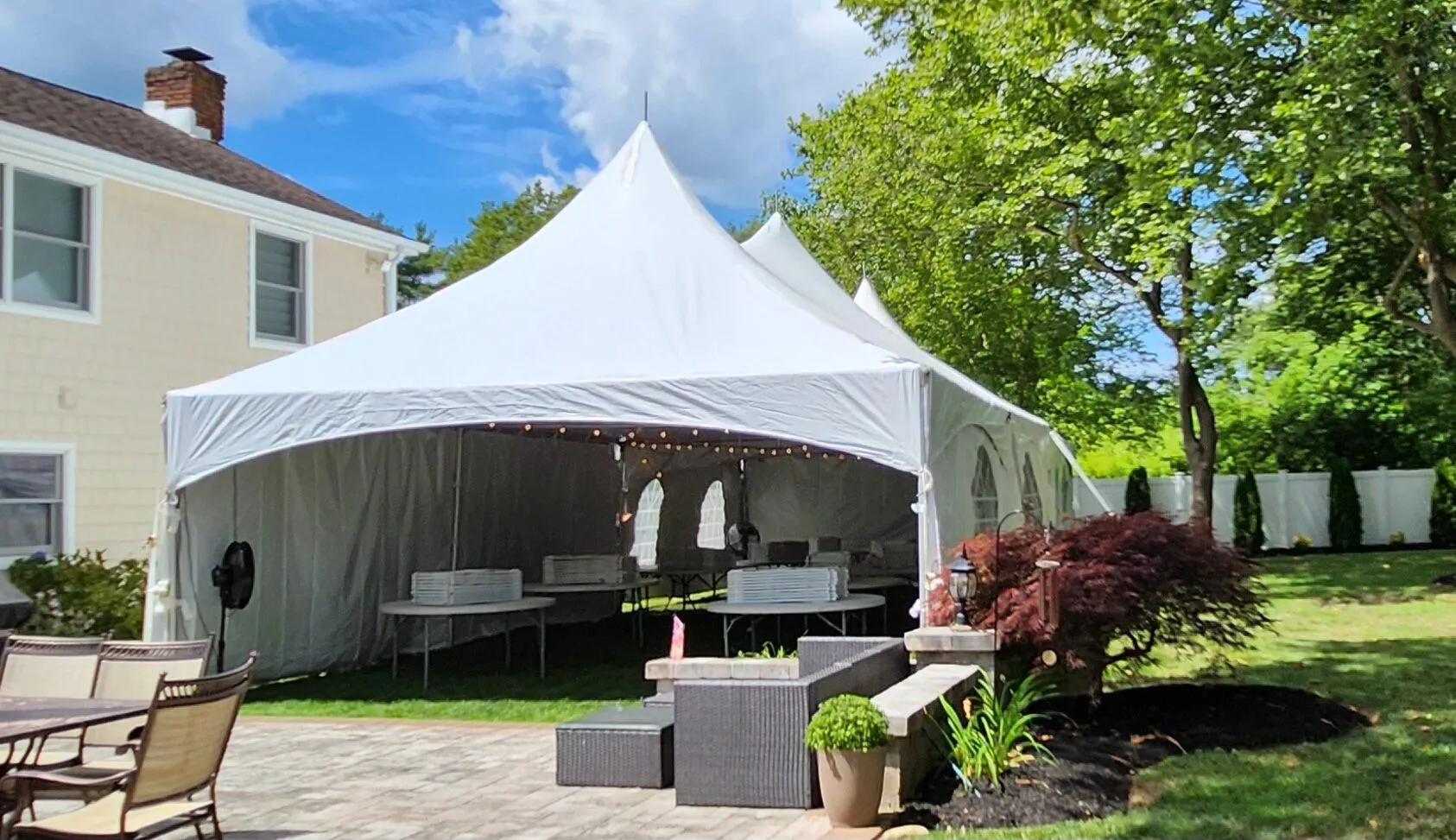 Tent Pro crew setup — 20x50 three-peak tent package in Lake Grove NY
