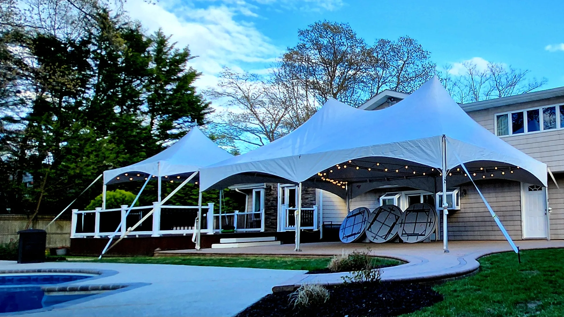 Custom multi-tent setup with 15x15 and 20x30 high peak tents on Long Island NY