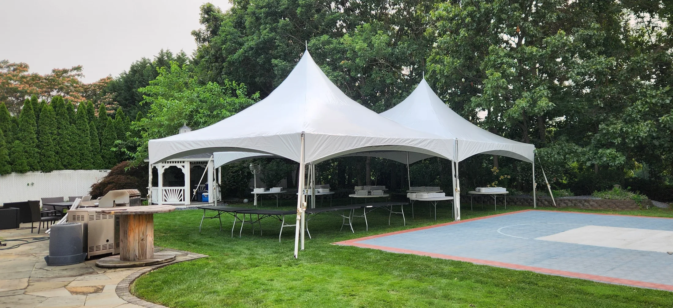 Custom multi-tent setup with 20x20 and 20x30 high peak tents on Long Island NY