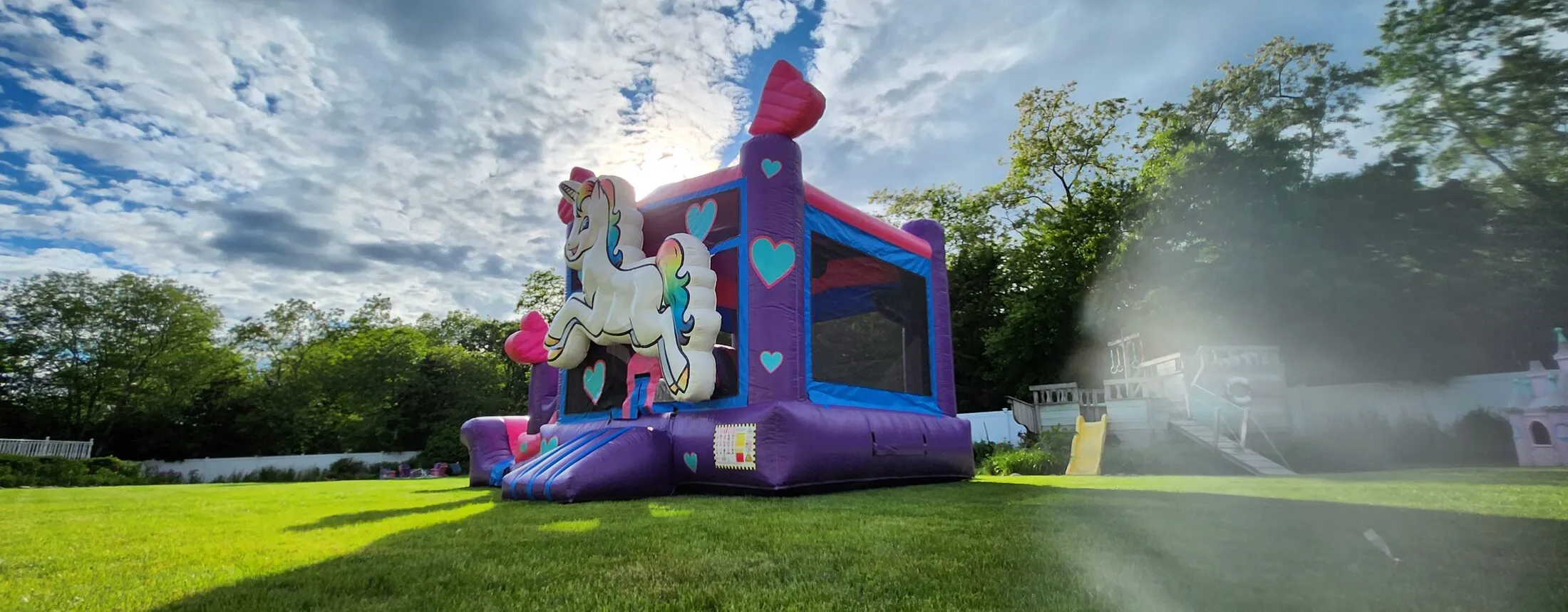 Unicorn bounce house with slide rental on Long Island NY